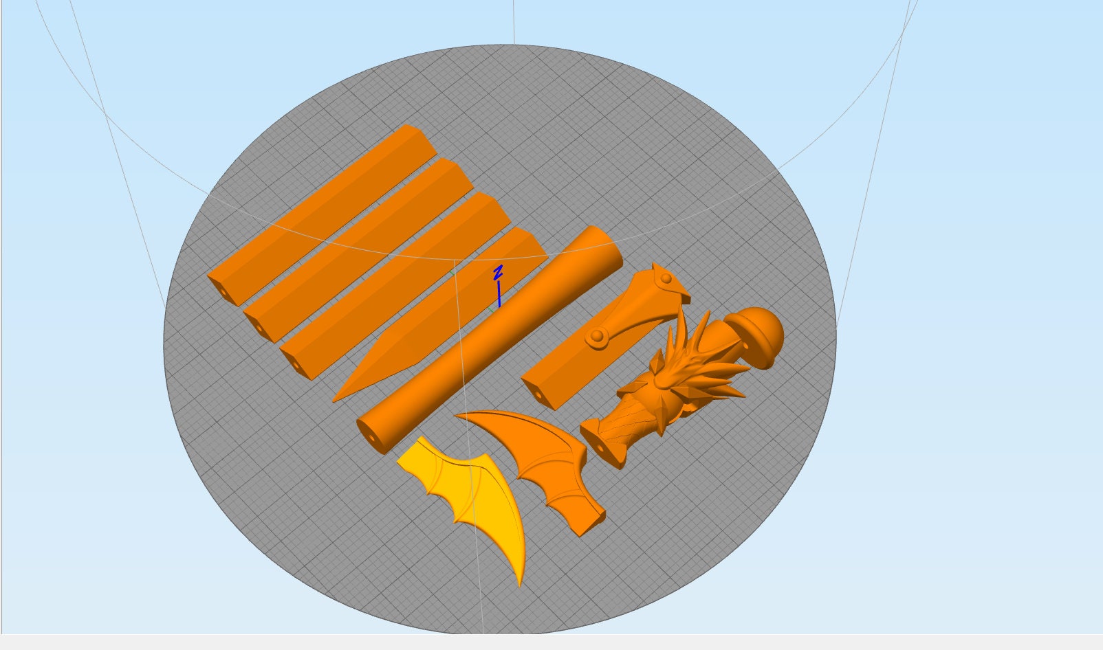 Orange 3D-printed model of a weapon on a gray background